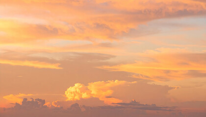 Fototapeta premium Orange Pink Sunset Sky with Soft Clouds