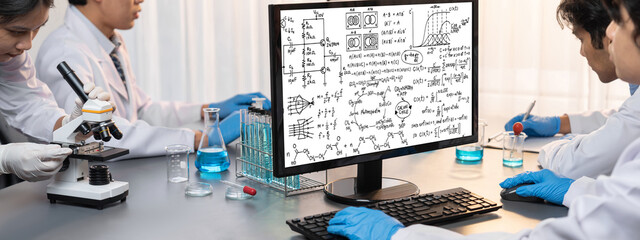 Mathematic equations and brisk formula on computer screen showing concept of science and education