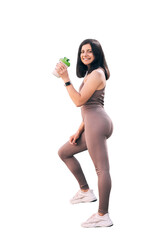 Athletic young woman in sportswear holding shaker with protein cocktail, isolated on a transparent background