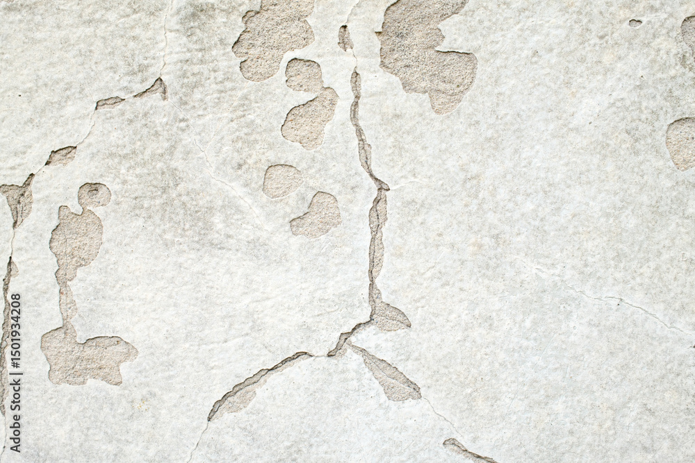 Poster cracked stone texture close up of stone slab with cracks and weathering creating a unique aged surfa