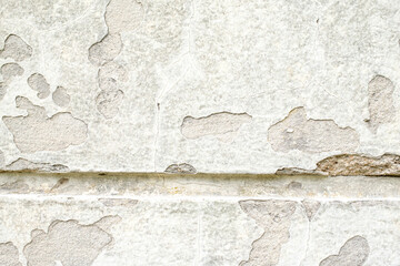 Distressed wall with chipped paint Texture detail for creative projects