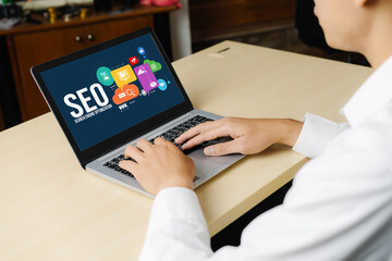 SEO search engine optimization for modish e-commerce and online retail business showing on computer...