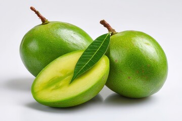 Green mangoes on white background with stem and natural leaf, raw tropical fruit image for chutney, healthy recipes, and food photography