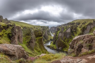 The Fjadrargljufur Canyon in South East Iceland is a prominent tourist attraction, featuring a unique landscape and a depth of about 100 meters