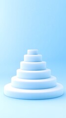 Fototapeta premium Pastel-blue tiered cylindrical platform against a light-blue backdrop, suggesting a minimalist product display or podium