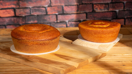 Cake, cake placed on a rustic wooden table and accessories, window light, selective focus.