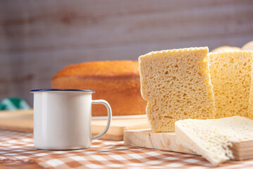 Breakfast table, beautiful breakfast table in Brazil with cake, cheese breads and more, on table with tablecloth, selective focus.