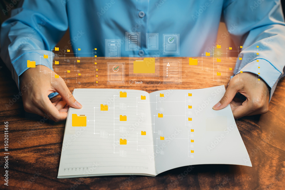 Poster concept of digital file management displayed on open notebook with yellow folder icons and data visu