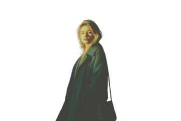 Elegant Woman in a Long Coat with Dramatic Lighting Fashion Photography High Contrast Atmosp