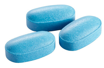 Three pale blue medicine tablets displayed on a transparent background
