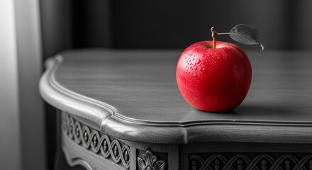 Single Red Apple on Ornate Silver Tray