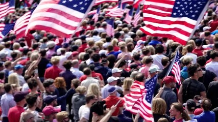 Patriotic gathering with diverse crowd holding american flags at outdoor rally - Powered by Adobe