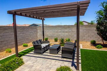 Back Yard Pergola Covering Wicker Furniture