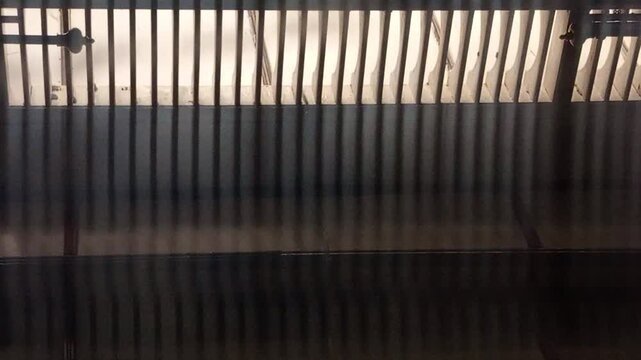 capturing the brilliant, reflective, and often magical effects that occur when light shines through or bounces off glass surfaces