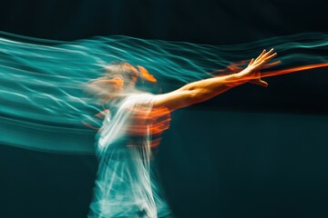 Abstract figure in motion, light trails