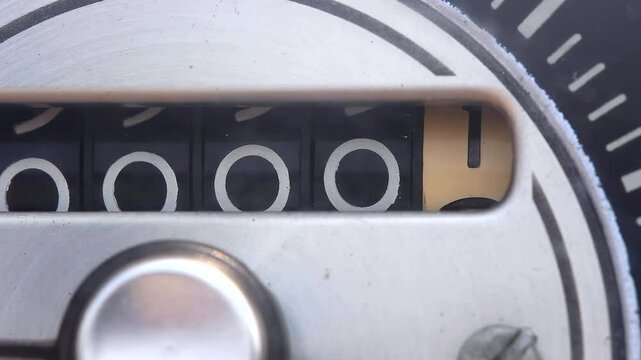 Analog Mechanical Odometer Advancing From 1 Tenth To 4 Tenths Of A Mile