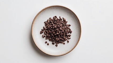 Cacao Nibs on a Ceramic Plate