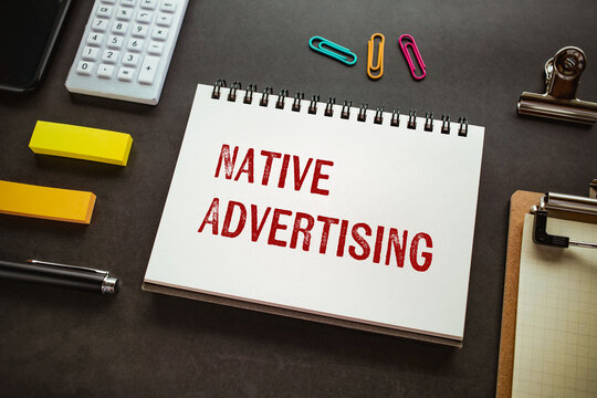 There is notebook with the word Native Advertising. It is as an eye-catching image.