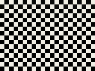 Fototapeta premium Classic black and white checkered pattern background, a timeless design for various creative applications and visual projects.