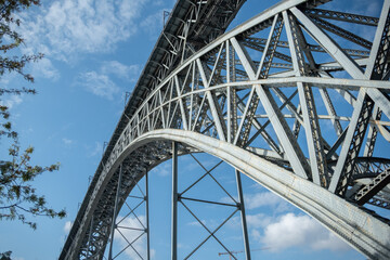Dom Luis Bridge from below, in Porto, Portugal. Steel construction spanning the River Douro.