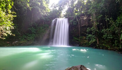 Turquoise pool mirrors waterfalls gentle cascade