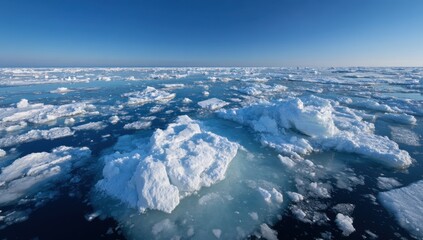 Fototapeta premium Arctic ice floes under clear blue sky