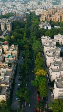 Top down Buildings and Apartment with Multiple Building aerial. Urban Buildings and Apartment at bridge road at Delhi. Cinematic cityscape drone shot. Noida Buildings.