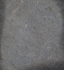 Rough, natural stone texture with earthy tones, perfect for rustic backgrounds and architectural design elements.
