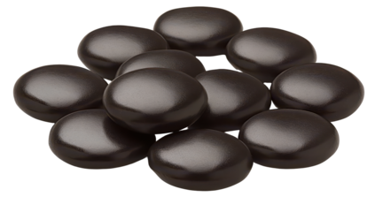 A cluster of dark, glossy, round candies, smooth and seemingly chocolate-flavored, piled casually together