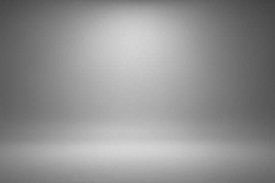Clean, empty gray studio background with soft lighting and smooth texture, ideal for product display or photography projects