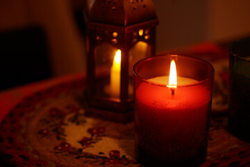Warm candlelight creates an inviting atmosphere indoors