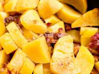 Delicious stewed potatoes infused with tender meat, showcasing an appetizing blend of flavors and textures for a comforting meal experience