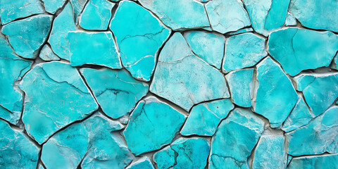 The wall is made of blue stone and has a rough, textured surface. The blue color is bold and stands out against the stone background