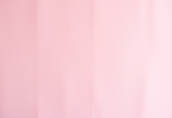 Smooth, light pink backdrop.
