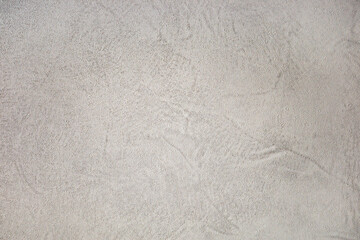 Light gray textured wall surface for background or design
