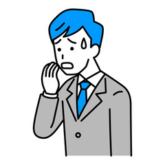 動揺しているスーツの男性