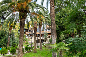 Image of the facade of the Gagra restaurant "Gagripsh". For visitors, the entrance to the restaurant is via a spacious stone staircase. A warm October day