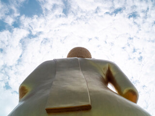 Behind the golden Buddha statue