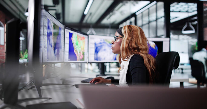African American Woman Researching Climate Science On Computer Screen