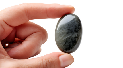 A smooth, polished worry stone held between two fingers, isolated on Transparent Background.