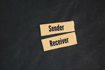 Paper with the words Sender and Receiver. seller and buyer concept. business concept