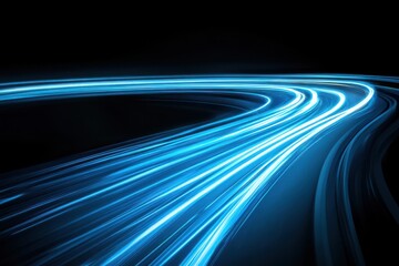Abstract blue light trails on a dark background showing speed