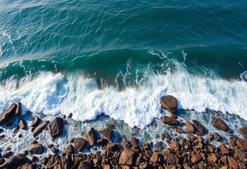 Ocean waves crashing on rocky shore, aerial view, sea background, sea waves
