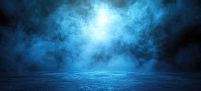Blue smoky background with bright light source and reflective floor