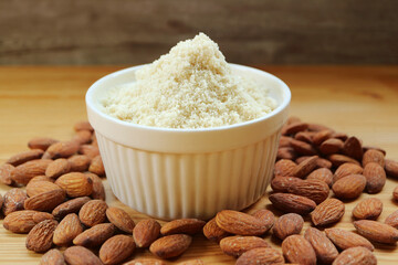 Closeup of almond flour, finely ground almonds for gluten free baking ingredient