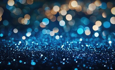 A dark backdrop with blue and gold bokeh lights and glitter.  A festive, elegant, and abstract design