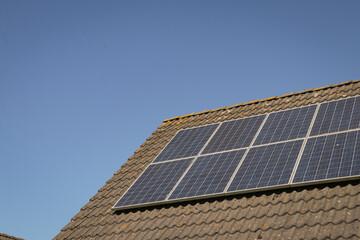 Solar panels on roof. Close up of green clean energy, sustainability, eco-friendly technology...