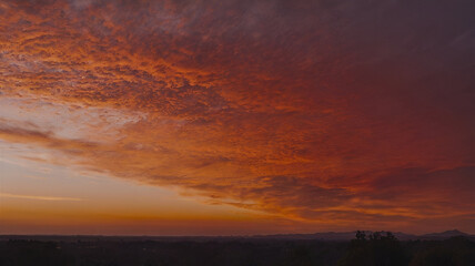 Obraz premium Sunset color gradient from orange to deep red