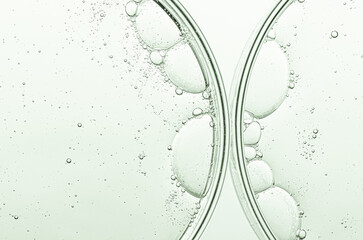 Cosmetic moisturizing gel or skin serum in a petri dish.