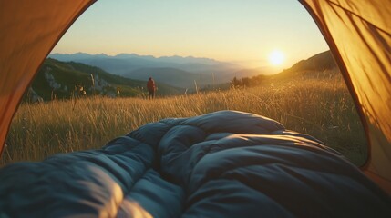 Beautiful sunrise seen from inside the tent, with a cozy sleeping bag on top and a hiker in the background, against a landscape of mountains and meadows, conveying an adventurous mood
